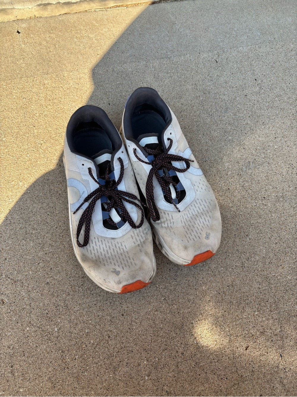 Women's on Cloud White Sneakers with Orange Toe Accent